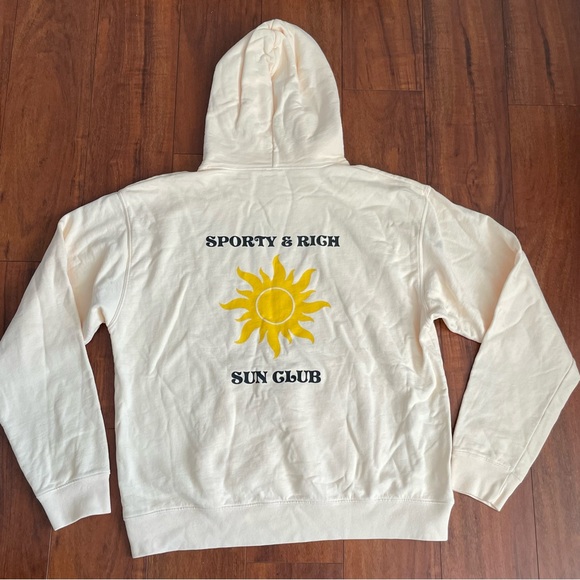 Sporty & Rich Other - Sporty & Rich Cream Hoodie with Yellow Sun Design